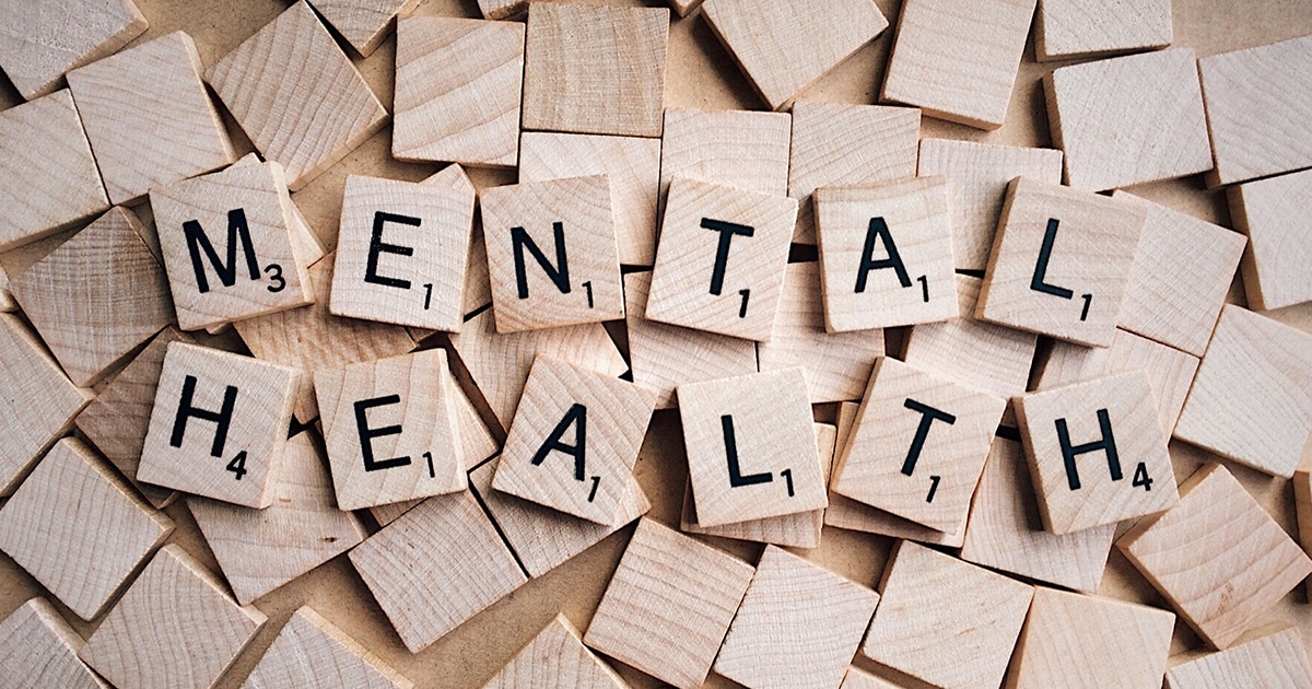 Mental health spelled out in Scrabble tiles