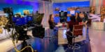 News studio set with four women
